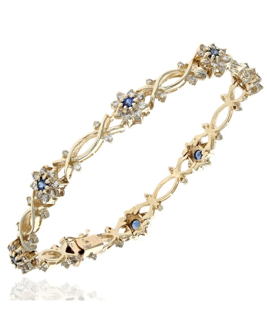 Diamond and Blue Sapphire Crossover Flower Link Bracelet in White Gold