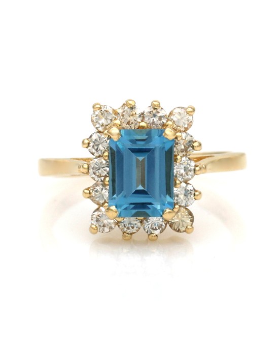 Emerald Cut Swiss Blue Topaz and Diamond Halo Ring