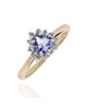 Tanzanite and Diamond Halo Ring in White and Yellow Gold